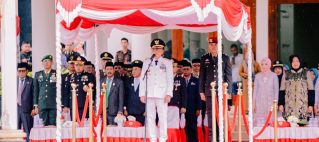 Bupati Ikram Malan Sangadji Irup HUT Bhayangkara ke-79