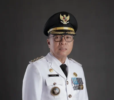 Dr. Ir. Ikram M. Sangadji, M.SI